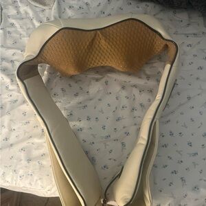 Cream and Tan Neck Massager